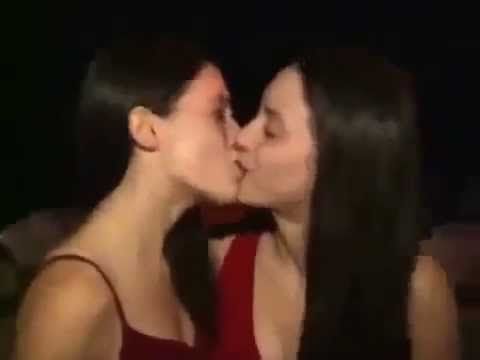 Lesbian twin sisters kissing