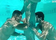 Stroking cock underwater with friends