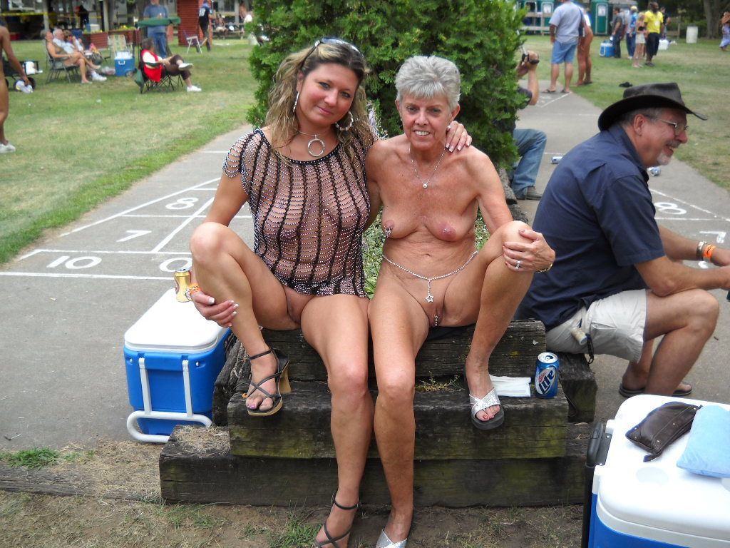 Mature naked woman in public